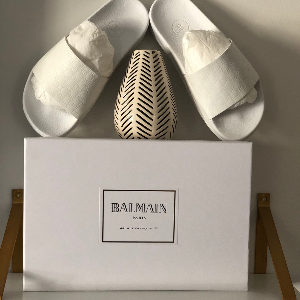 Balmain logo sliders